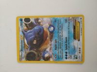 Unsure of these 4 old pokemon cards