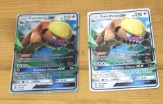 [PokeCommunity.com] Real or not? Holo card vs plain card??