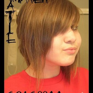 first homemade haircut July '07
bahaha bet you can figure out my myspace. xD