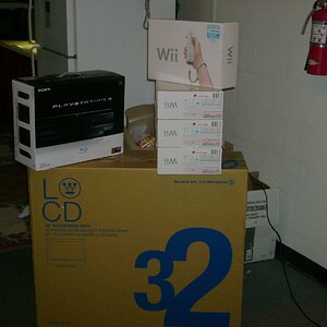 4 Wiis, a 32" plasma display (1080p), and a 20GB Playstation 3 system on the Playstation release date! (we, my next door neighbour and I, got escorted