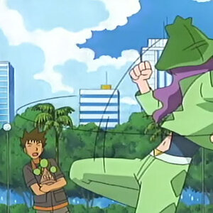 It looks like he's trying to beat up Brock, but he's actually just having a sissy fit over what May said to him. =]
