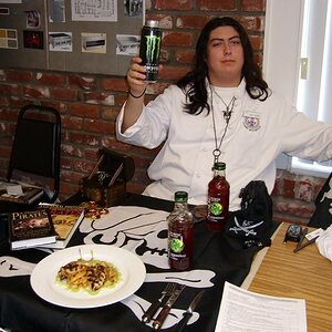 Yer captain with his glorious creation of his dish of "Avery Chicken" with the sides of the "Pyrice of the Caribbean" and "Monkepples Barbossa" as his