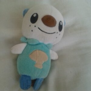 Here is my adorable Oshawott plush! I named him Gregory =D <3!!!!