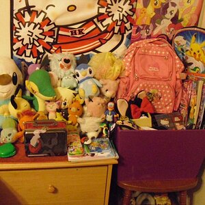 Uhh, part of my room! LOL.
My small desk with stuff of mine. xD