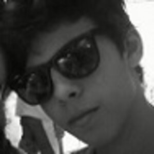 Me with my friend's sunglasses one year ago in a camp.
