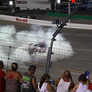Brad Keselowski's #2 Miller Lite Ford Fusion (American Flag Design) car doing a burnout after leading 90% of the laps to victory lane!
Quaker State 40