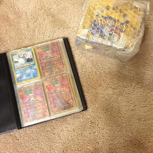 My book of rare Pokemon cards including 11 Ancient Mew cards and a Marrill WOTC Black Star Promo. Also a BASE SET BOOSTER BOX