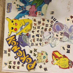 Front of my Pokemon Card Binder that I've had since I was 8. The small Pokemon stickers are from Red/Blue Strategy Guide while the rest of the Pokemon