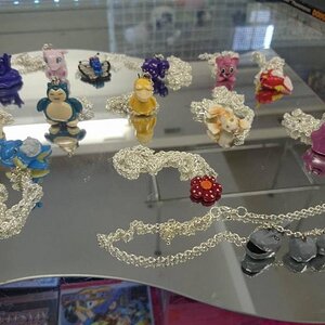 Various Hand made Pokemon inspired necklaces; Lapras, DItto, Goldeen, Butterfree, Muk, Mew, Magicarp, Jigglypuff, Snorlax, Cubone, Onix and Vileplume